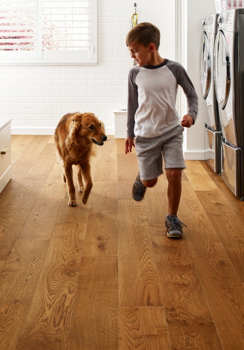 Kid running with dog | Floor Magic